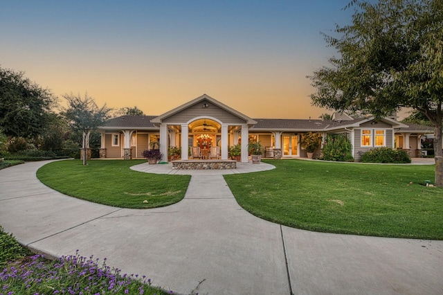 craftsman inspired home with a yard