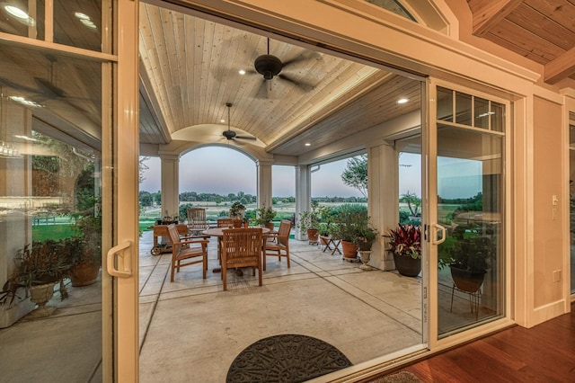 patio terrace at dusk with ceiling fan