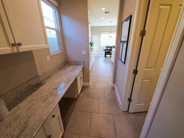 bathroom with tile patterned flooring