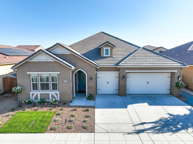 view of front of property featuring a garage