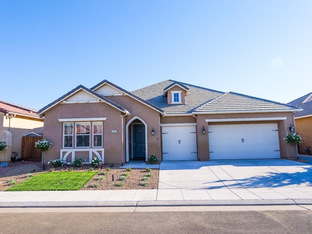 view of front of property with a garage