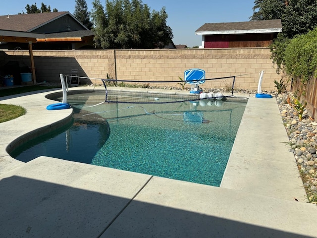 view of pool featuring a patio area