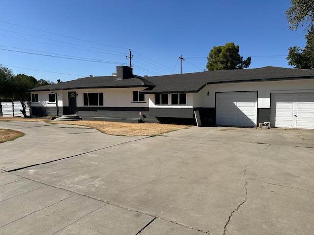 ranch-style home with a garage