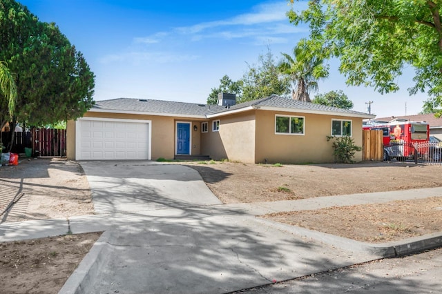 single story home featuring a garage