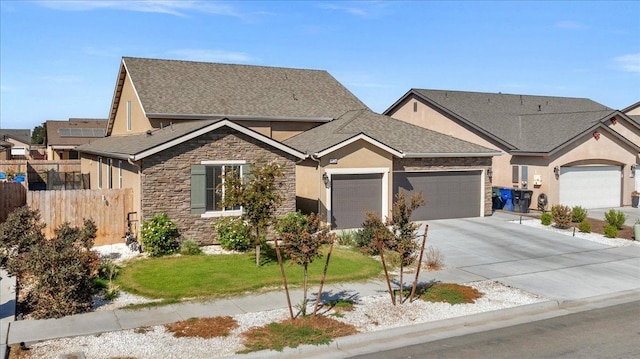 view of front of house with a garage and a front yard