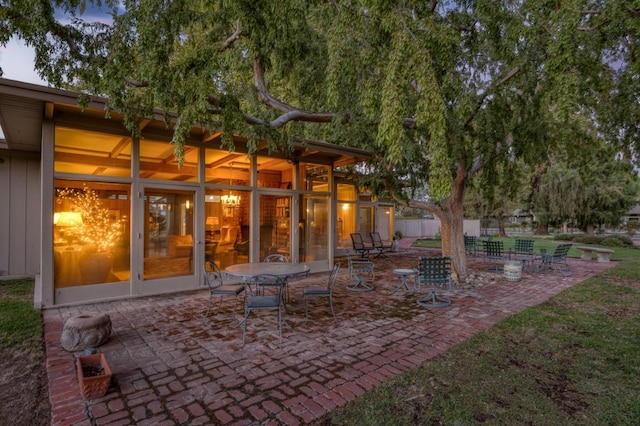 view of patio terrace at dusk