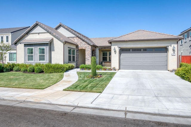 ranch-style home featuring a front yard and a garage