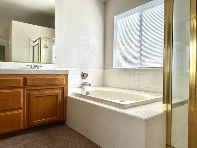 bathroom with vanity and plus walk in shower