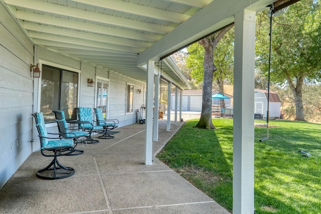 view of patio / terrace with a storage unit