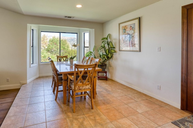 view of tiled dining space