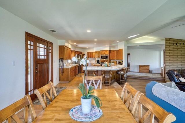 dining room with light wood-type flooring