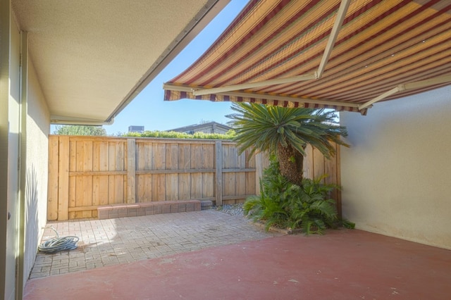 view of patio / terrace with fence