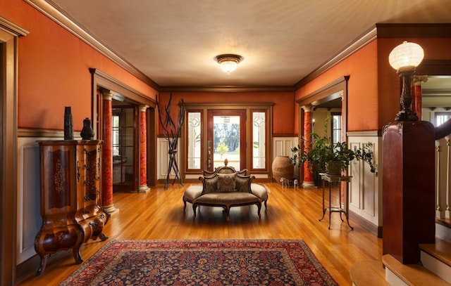 9486 E Lincoln Ave, Del Rey, CA 93616 - foyer featuring ornamental molding, a wainscoted wall, wood finished floors, and plenty of natural light