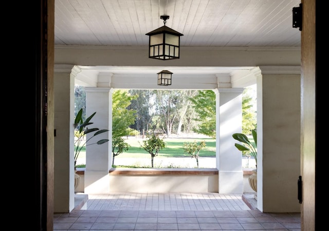 9486 E Lincoln Ave, Del Rey, CA 93616 - entryway with tile patterned flooring, wooden ceiling, and ornamental molding