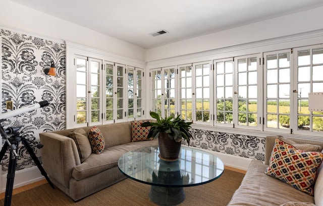 9486 E Lincoln Ave, Del Rey, CA 93616 - sunroom with wallpapered walls, wood finished floors, visible vents, french doors, and baseboards