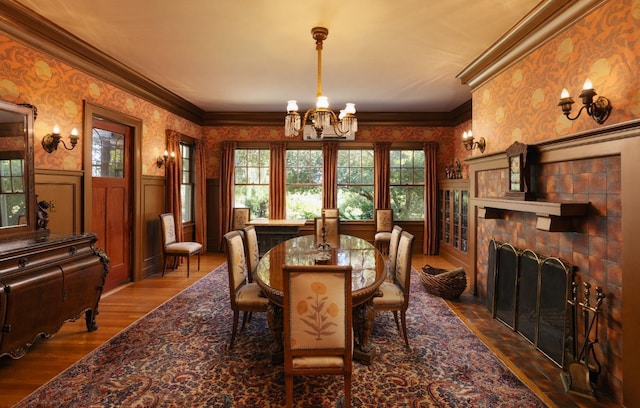 9486 E Lincoln Ave, Del Rey, CA 93616 - dining room with a chandelier, wallpapered walls, a healthy amount of sunlight, and a wainscoted wall