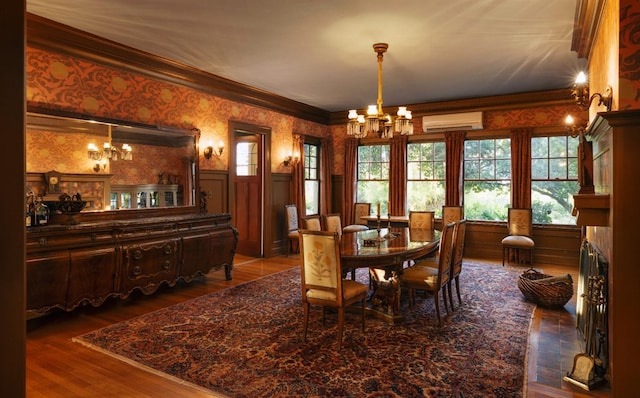 9486 E Lincoln Ave, Del Rey, CA 93616 - dining area featuring wainscoting, wallpapered walls, a chandelier, and a wall unit AC