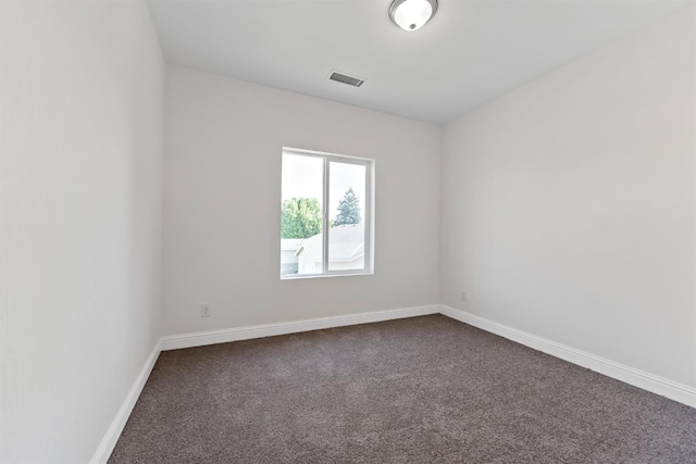 unfurnished room with carpet floors