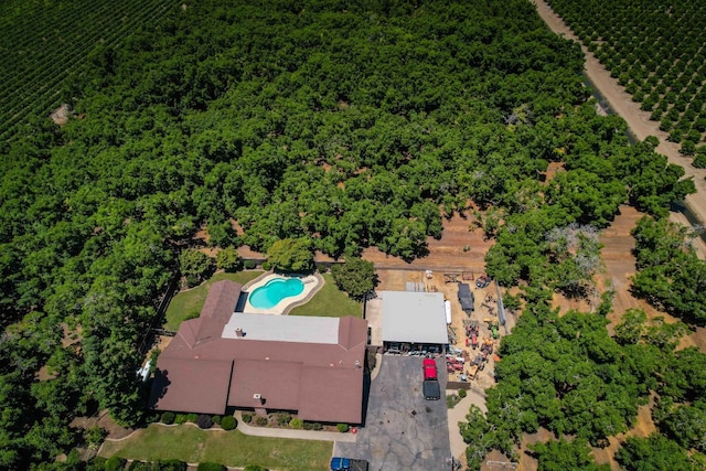 birds eye view of property with a rural view