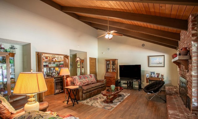 living room featuring a fireplace, wooden ceiling, beverage cooler, ceiling fan, and hardwood / wood-style flooring