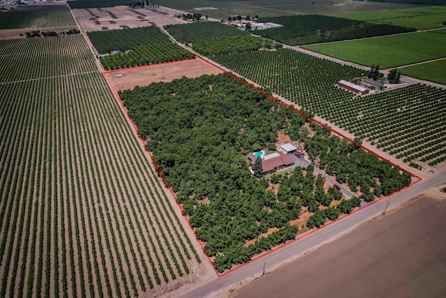 birds eye view of property featuring a rural view