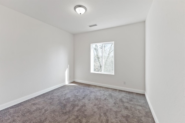 unfurnished room featuring carpet floors