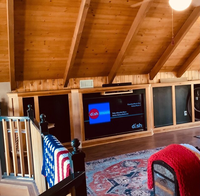 interior space with wood finished floors, visible vents, vaulted ceiling with beams, and wooden ceiling