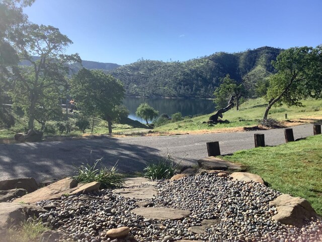 mountain view featuring a water view