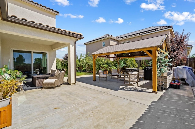 view of patio with a gazebo and an outdoor hangout area