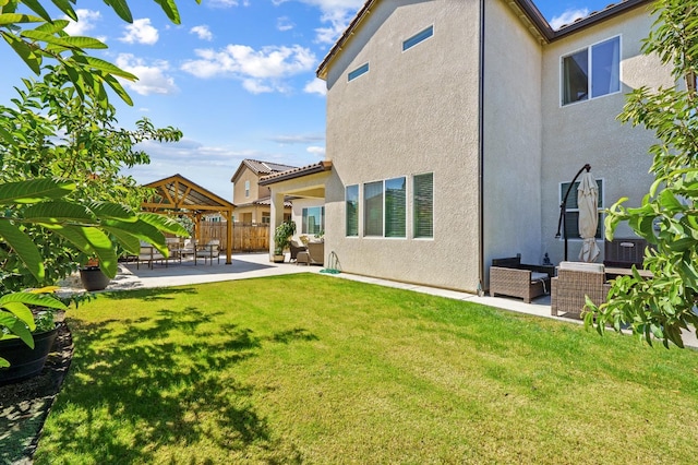 view of yard featuring a gazebo and a patio area