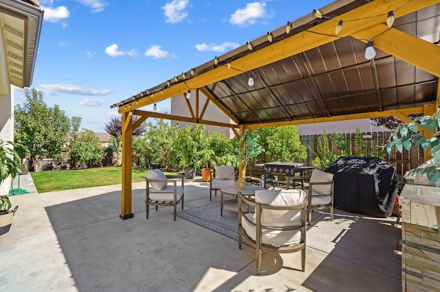 view of patio featuring a gazebo and grilling area