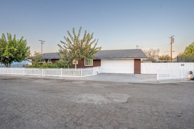 ranch-style home with a garage