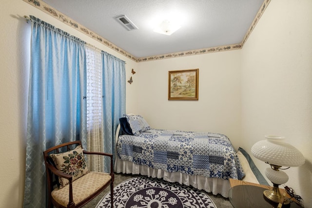 bedroom with a textured ceiling