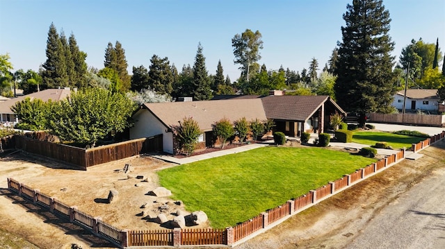 view of front of property with a front lawn