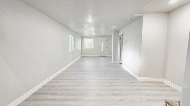 hall featuring light hardwood / wood-style floors