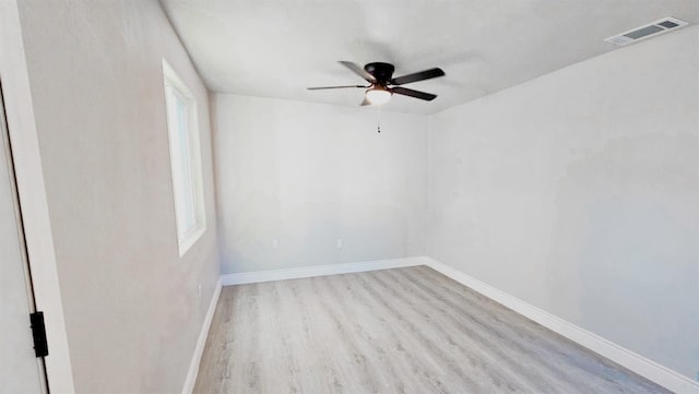 spare room with ceiling fan and light hardwood / wood-style flooring