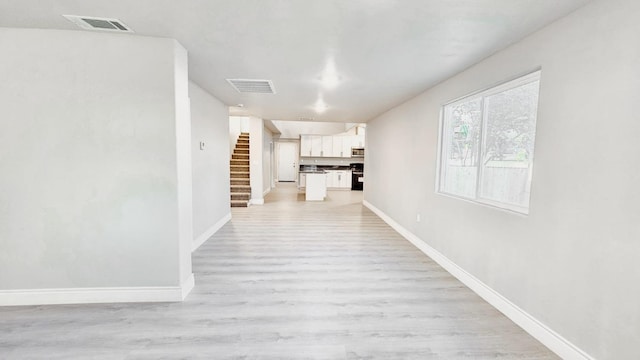 hall featuring light hardwood / wood-style floors