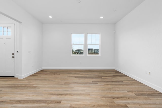 285 S Huckleberry Ln S, S, CA 93636 - unfurnished room featuring baseboards, recessed lighting, and light wood-type flooring