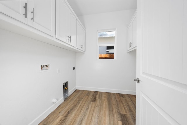 285 S Huckleberry Ln S, S, CA 93636 - clothes washing area featuring wood finished floors, hookup for an electric dryer, baseboards, cabinet space, and hookup for a washing machine