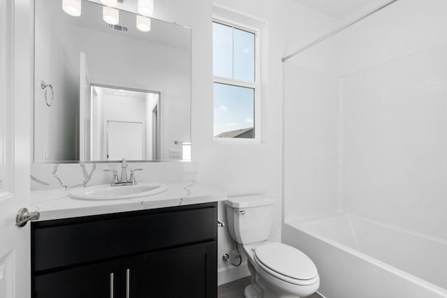 full bathroom featuring vanity, toilet, bathtub / shower combination, and visible vents