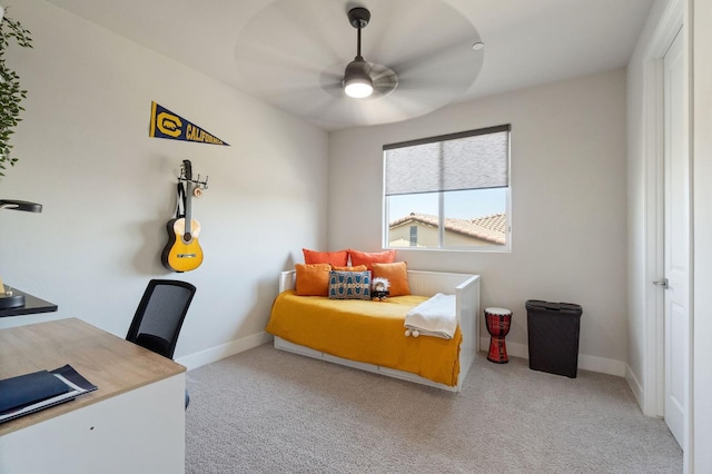 1007 Highland Rd W, Madera, CA 93636 - bedroom with carpet floors, baseboards, a desk, and ceiling fan