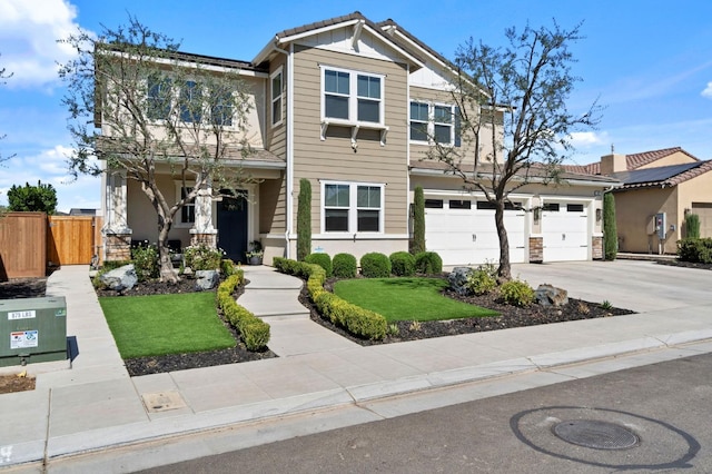 view of front of property with a garage