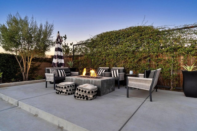 1007 Highland Rd W, Madera, CA 93636 - view of patio with an outdoor fire pit and a fenced backyard