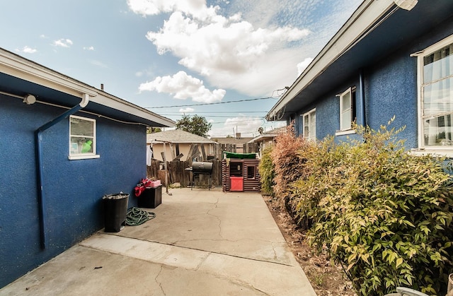 view of home's exterior with a patio area