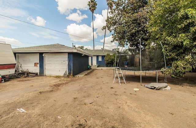 view of front of house with a trampoline