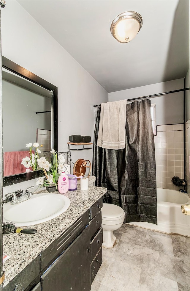 full bathroom featuring shower / bathtub combination with curtain, vanity, and toilet