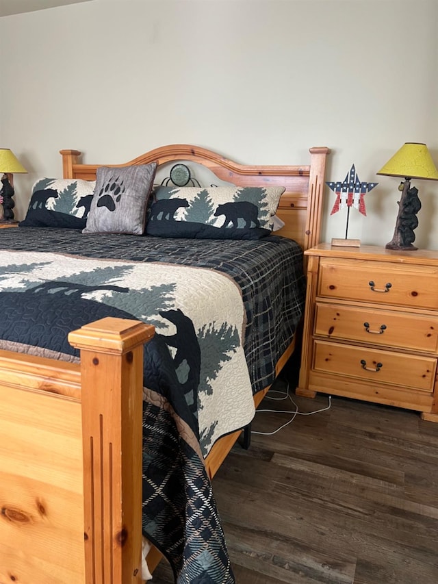 bedroom featuring dark hardwood / wood-style floors