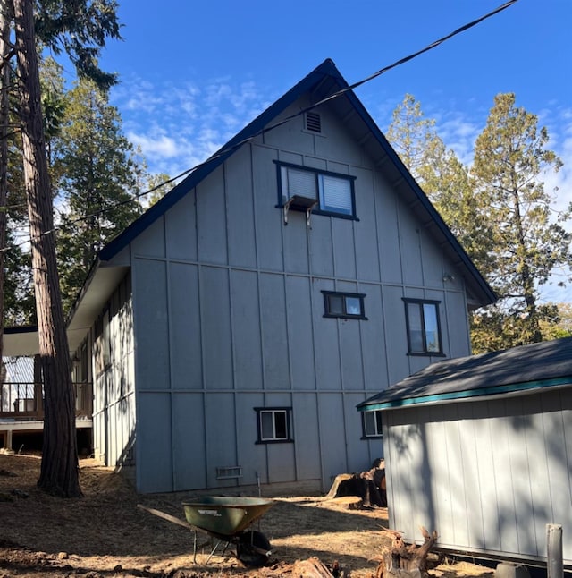 view of property exterior with board and batten siding