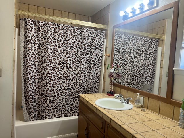 bathroom with vanity and shower / bathtub combination with curtain