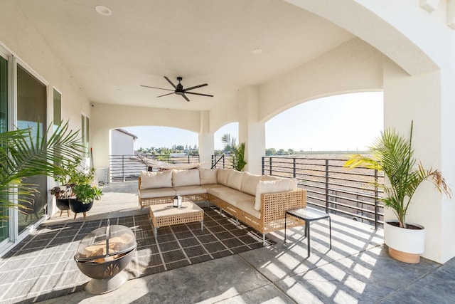 view of patio / terrace featuring an outdoor living space and ceiling fan